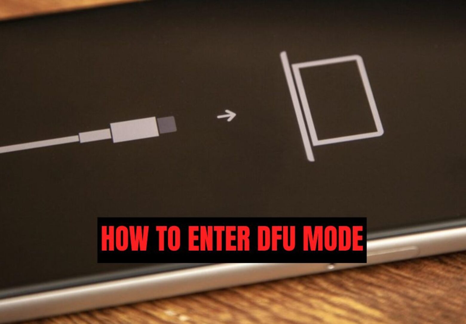 iPhone screen showing a cable and computer icon, indicating instructions for how to enter DFU mode on iPhone for system recovery.
