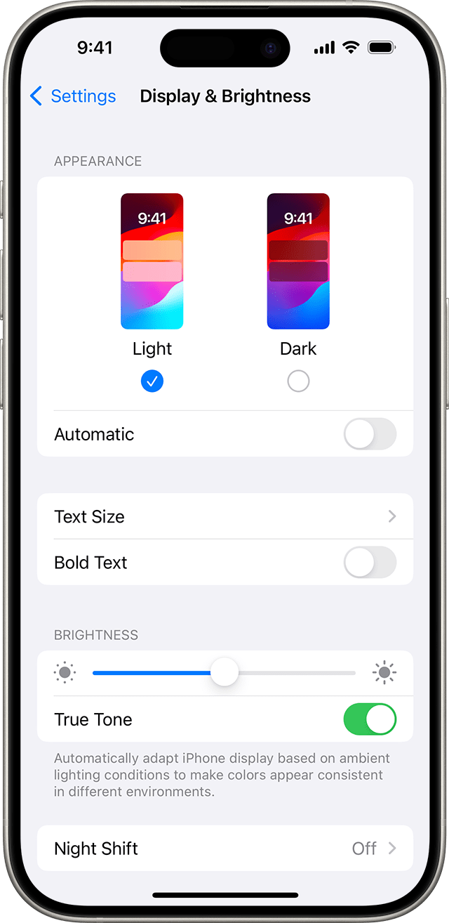 iPhone 16 Battery Draining Fast? Here's How Users Can Fix It 8 iPhone 14 screen showing Display & Brightness settings with Light mode selected, True Tone enabled, and brightness slider adjusted.