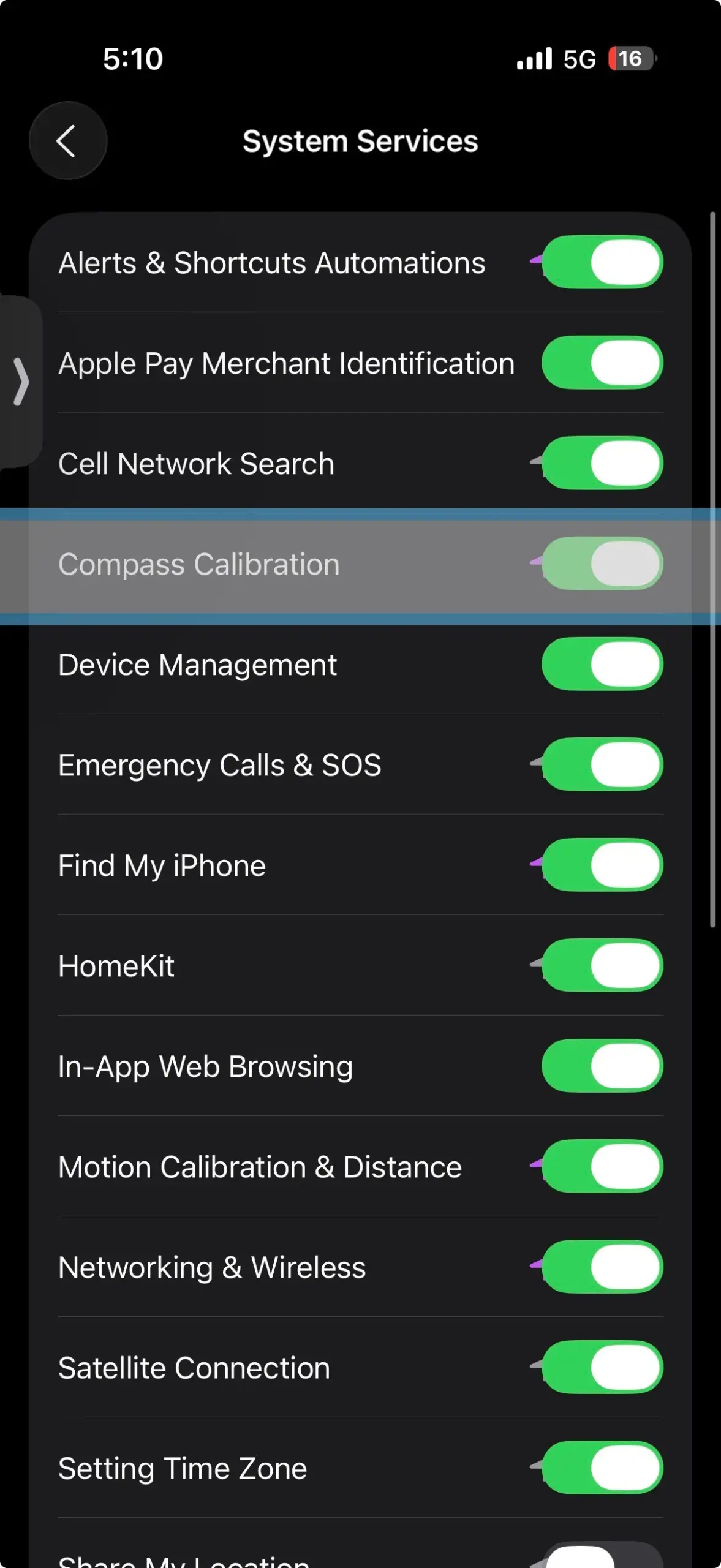 iPhone System Services screen showing Compass Calibration setting turned off, which can affect navigation and directional accuracy.