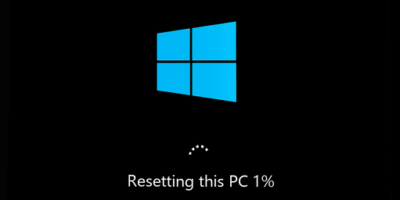 Windows reset screen showing progress at 1% with a message stating “Resetting this PC” on a Microsoft Surface device.